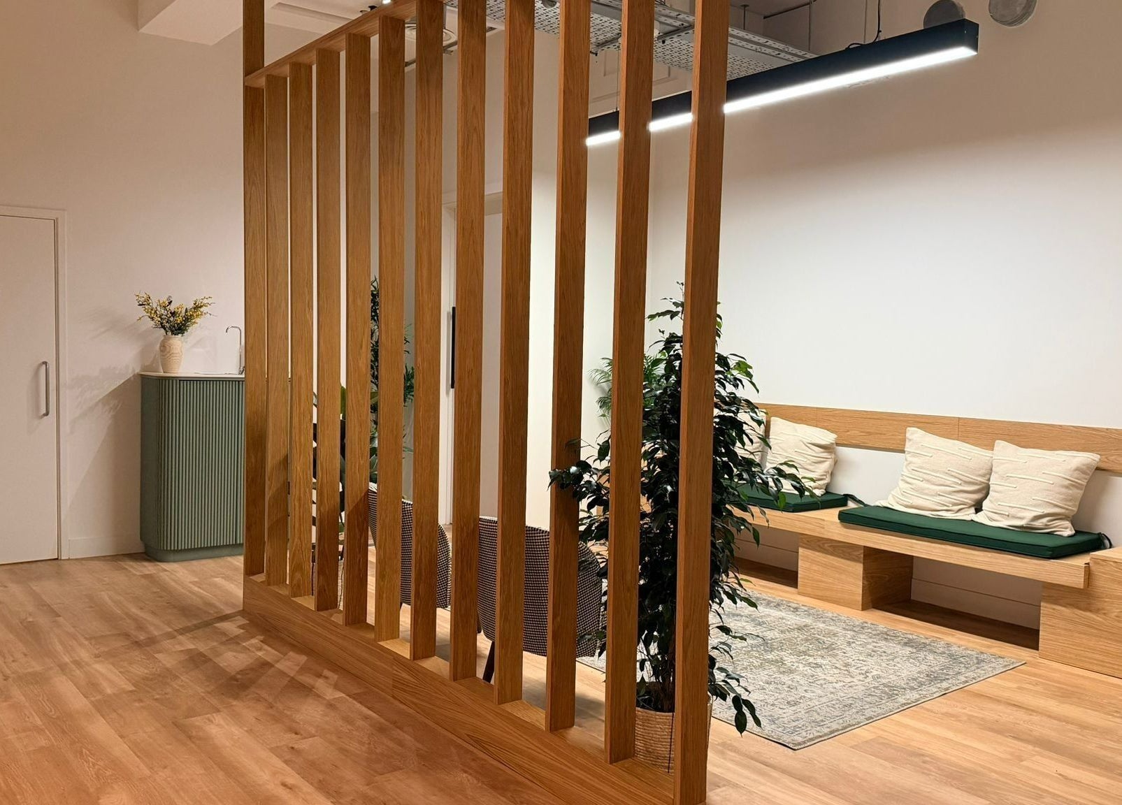 Elegant lounge area at Maen (Men) Old Street, London, England, GB, featuring cozy seating and warm decor.