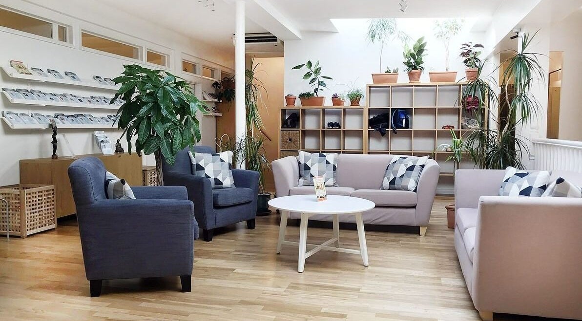 Relaxing seating area at Danugur Belgravia - Victoria, London, England, GB with modern decor and lush plants.