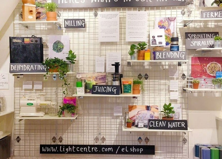 Wellness equipment display at Maen Monument, London, England, GB showcasing juicing and dehydrating tools.