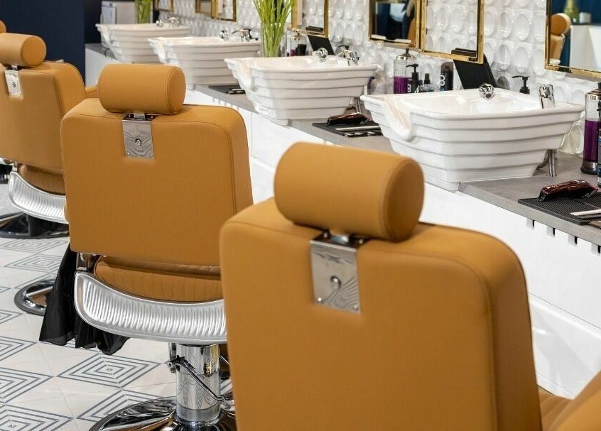 Elegant barber chairs at Shave Barbers - City Walk, Dubai, Dubai, AE, showcasing modern grooming interior.