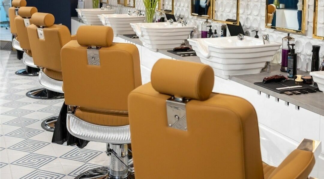 Elegant barber chairs at Shave Barbers - City Walk, Dubai, Dubai, AE, showcasing modern grooming interior.