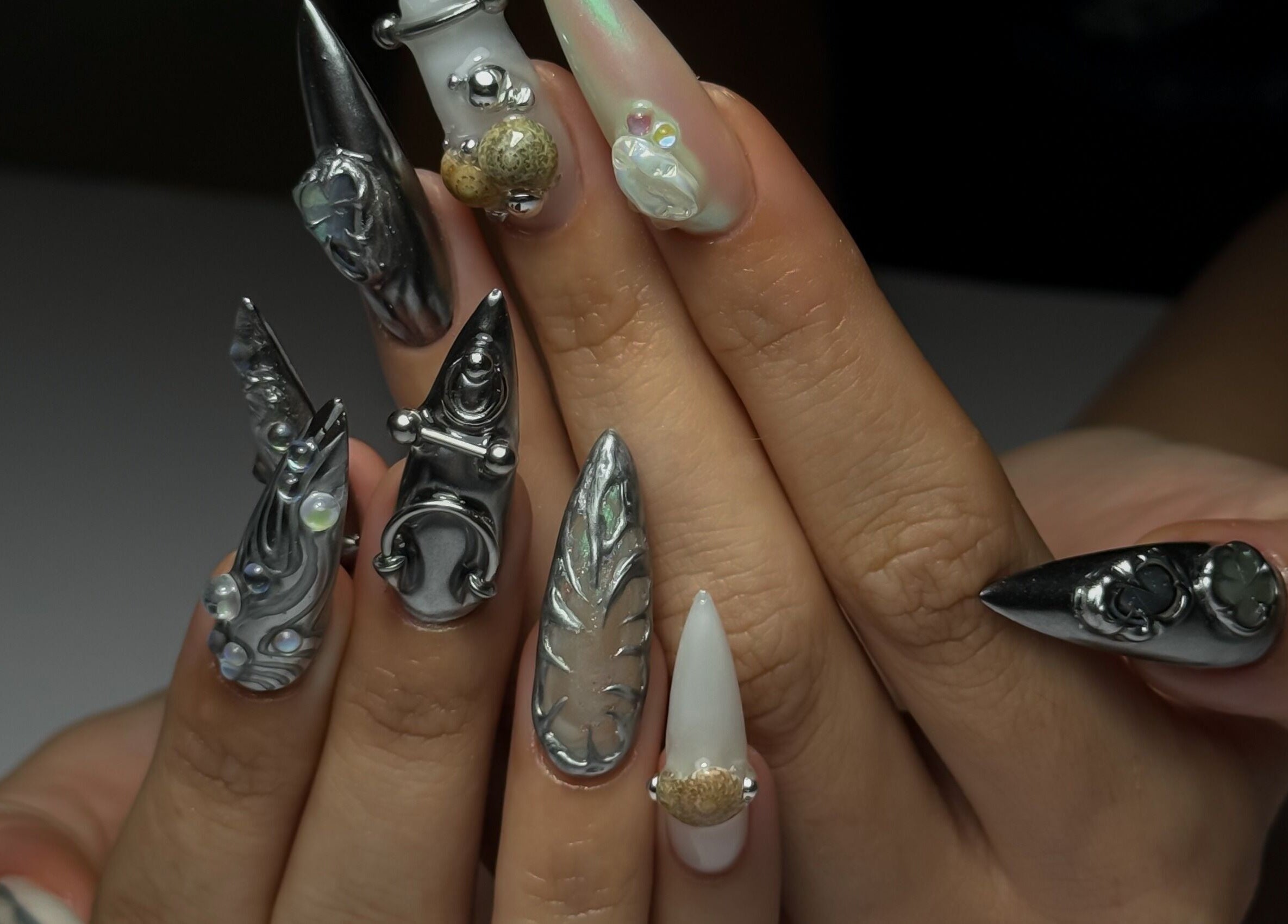 Intricate metallic nail art at Cupid Nail Studio, Varsity Lakes, Queensland, AU.