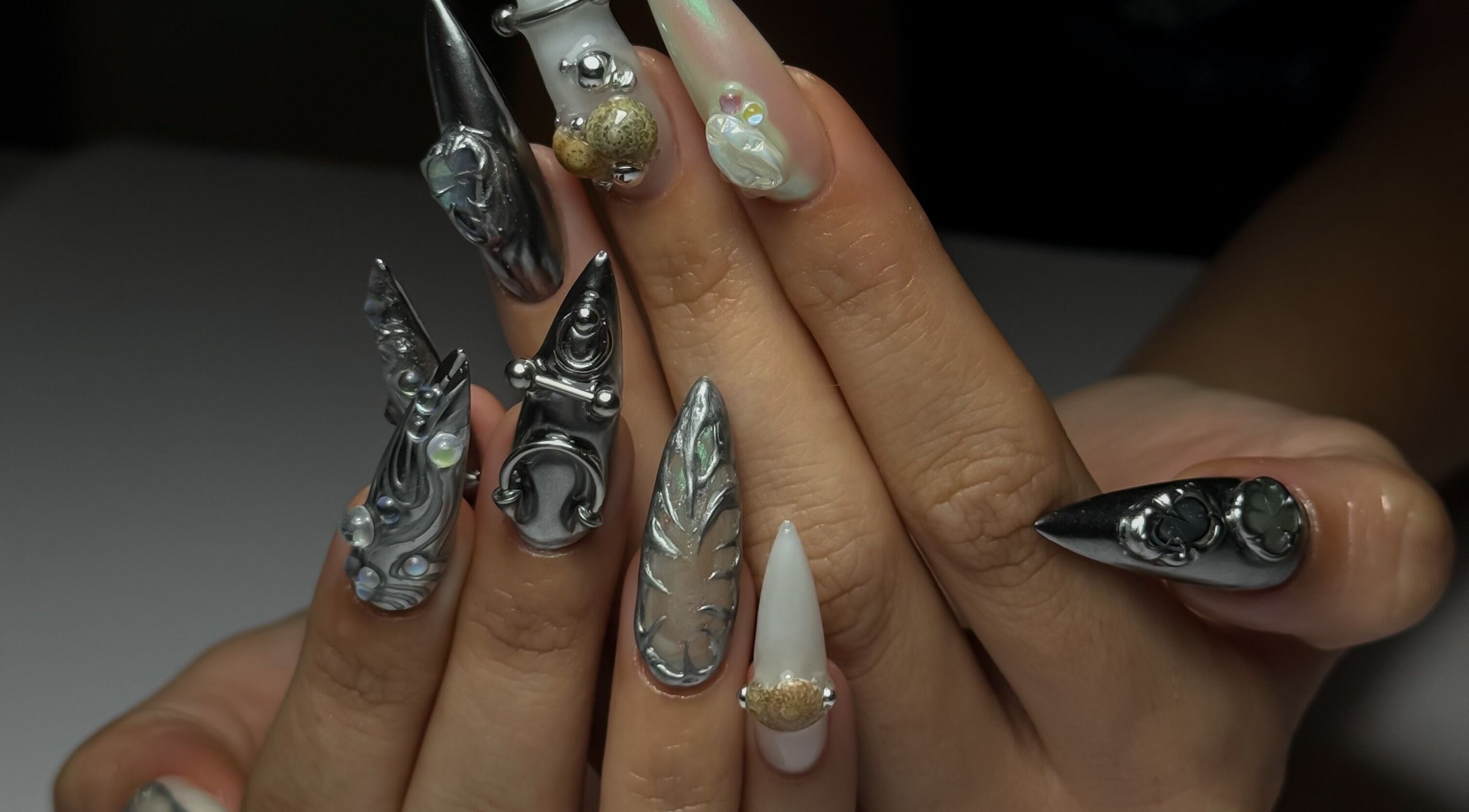 Intricate metallic nail art at Cupid Nail Studio, Varsity Lakes, Queensland, AU.