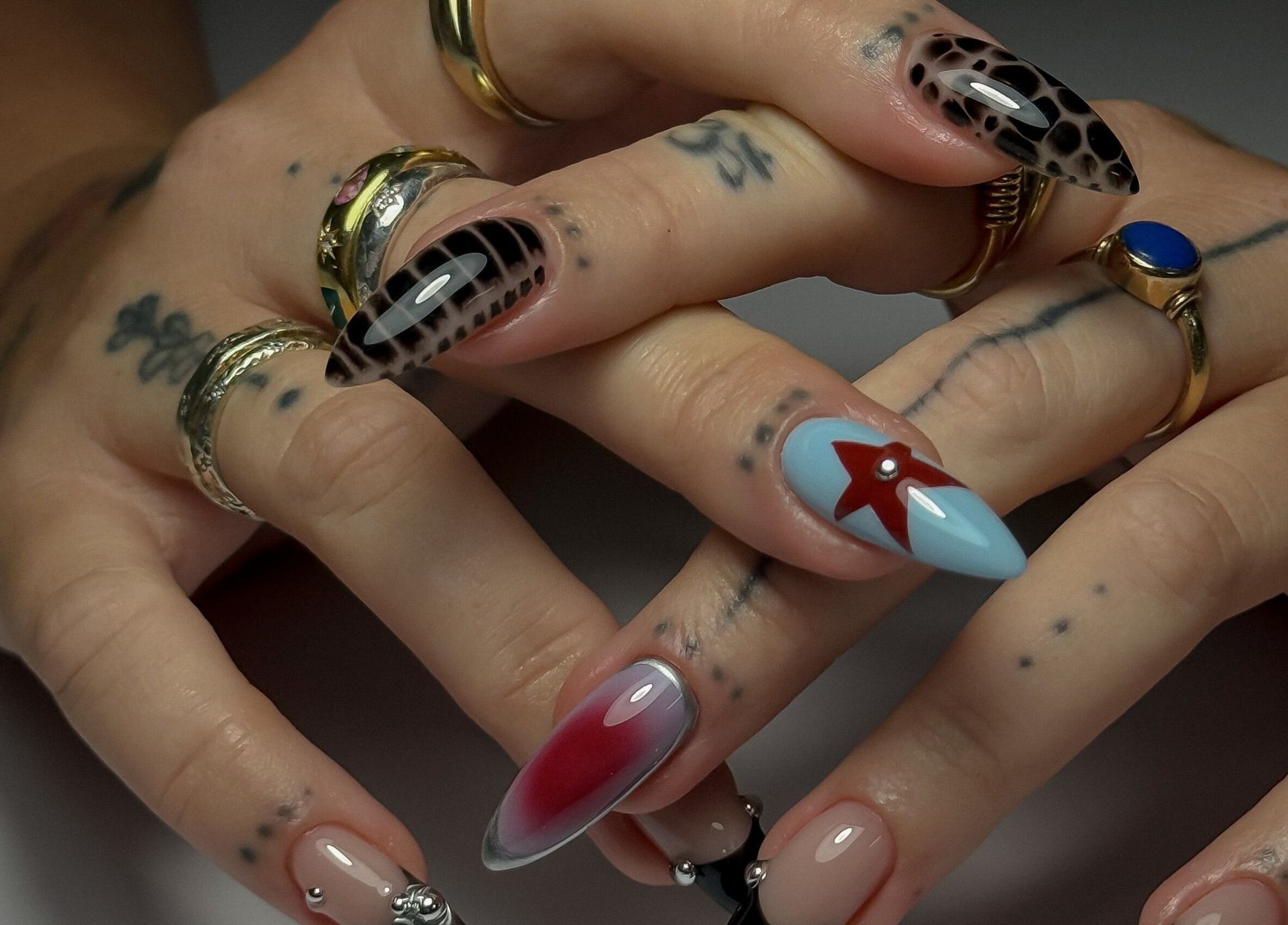 Unique nail art at Cupid Nail Studio, Varsity Lakes, Queensland, AU, showcasing intricate designs and vibrant colors.