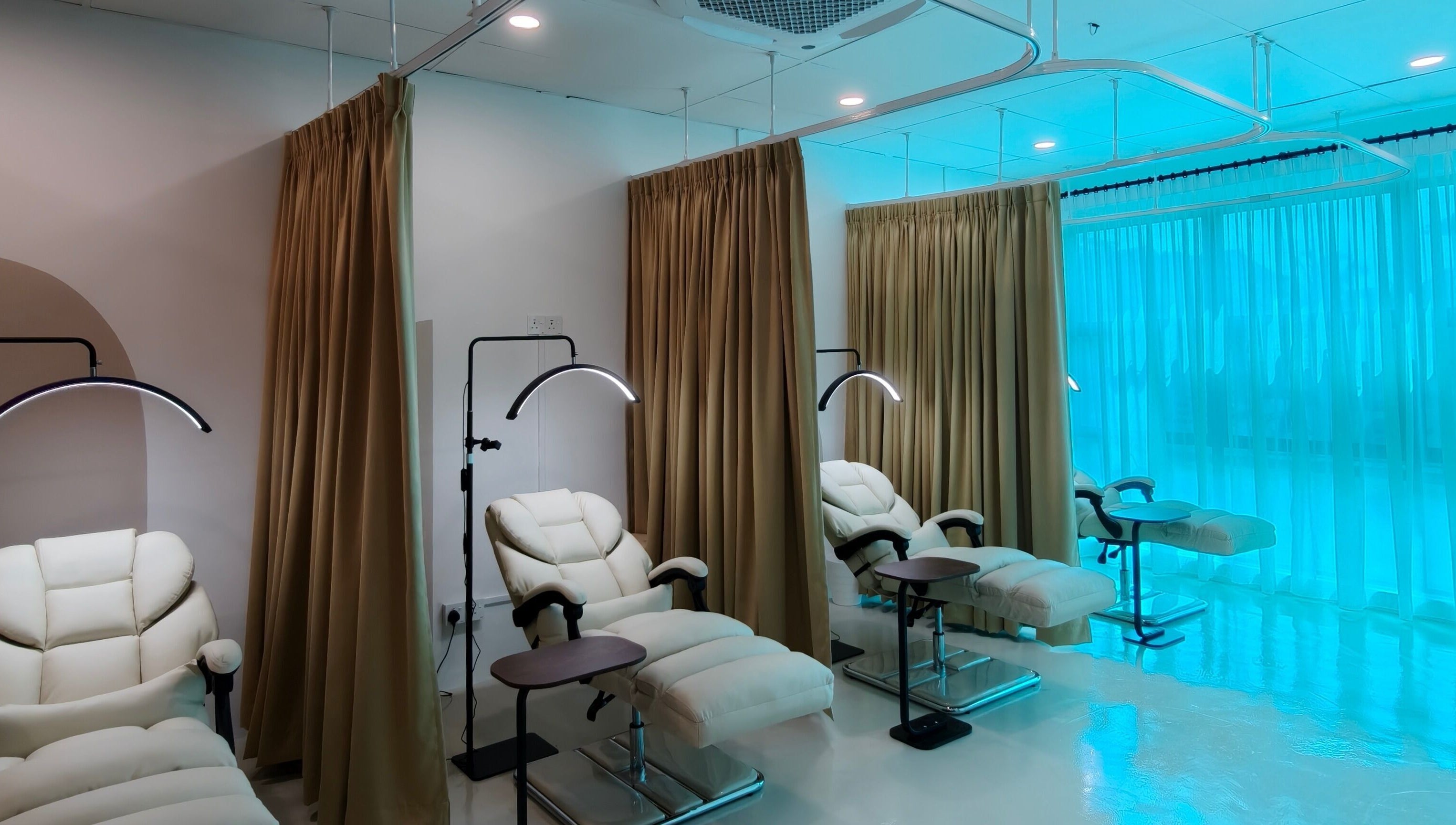 Luxurious treatment chairs at Nuay Beauty, Shah Alam, Selangor, MY, offering a calm and inviting wellness space.