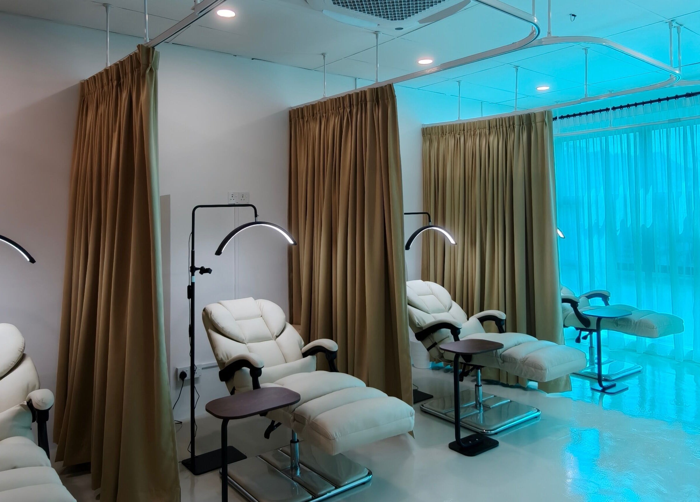Luxurious treatment chairs at Nuay Beauty, Shah Alam, Selangor, MY, offering a calm and inviting wellness space.