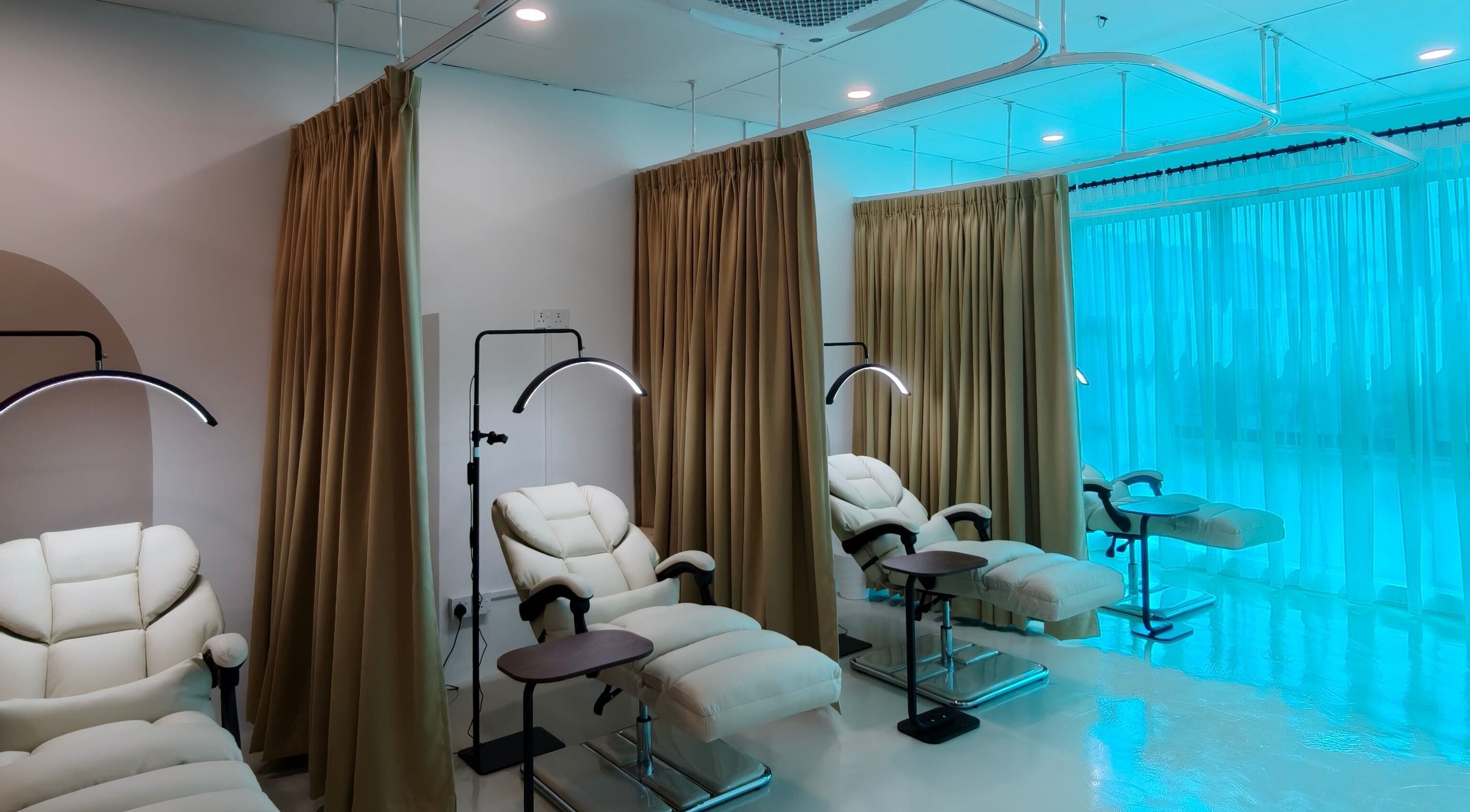 Luxurious treatment chairs at Nuay Beauty, Shah Alam, Selangor, MY, offering a calm and inviting wellness space.