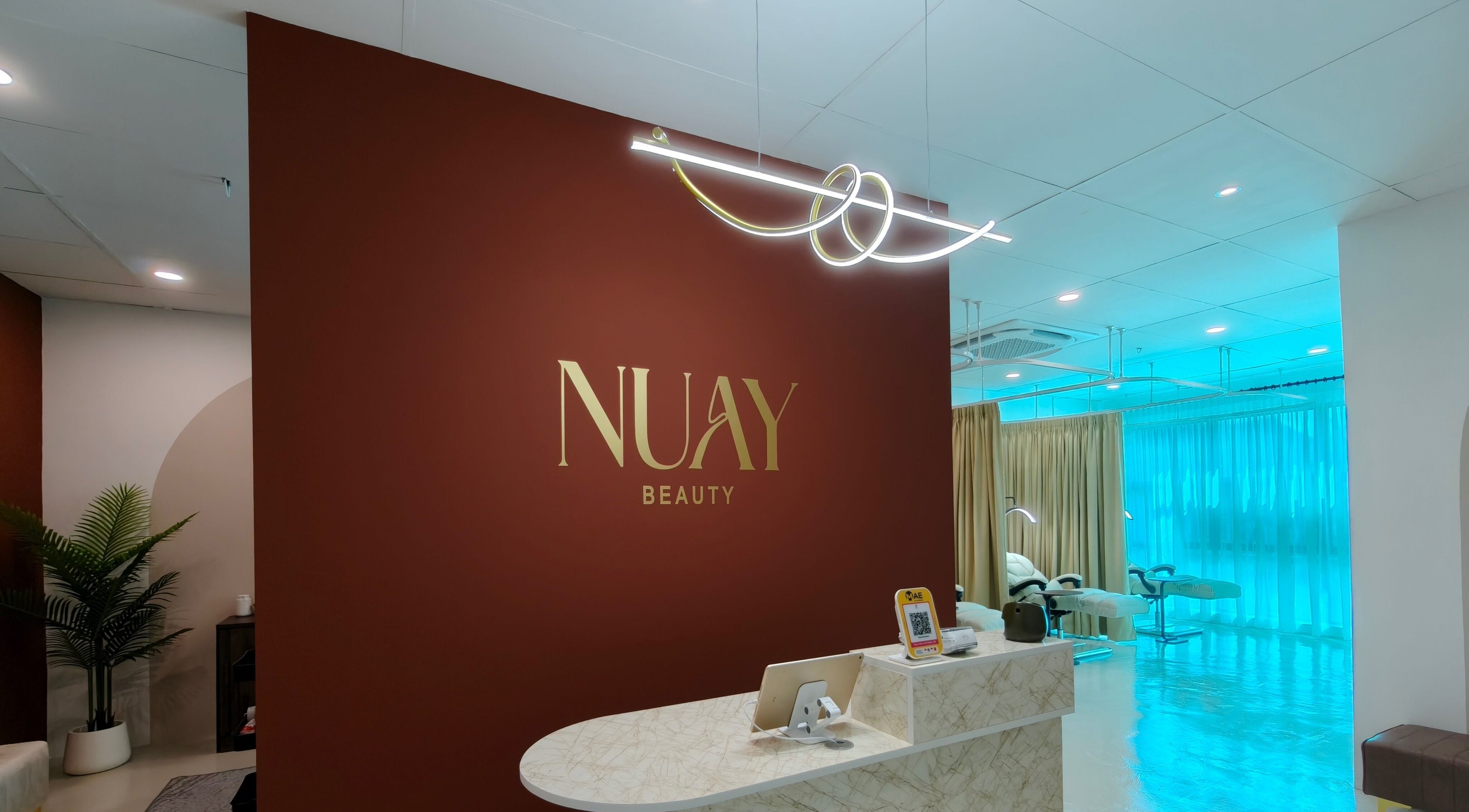 Nuay Beauty reception area in Shah Alam, Selangor, MY featuring modern decor and elegant lighting.