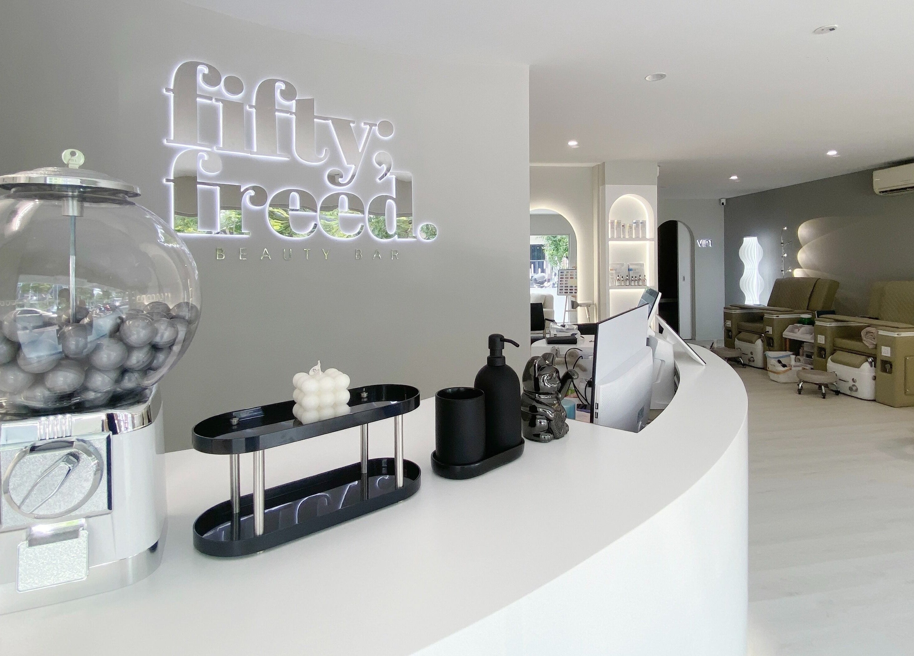 Modern interior of @fiftyfreed.sg - Eng Kong Terrace, Singapore, SG, with stylish reception and cozy seating area.