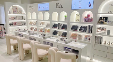 Chic nail salon interior at @fiftyfreed.sg - Choa Chu Kang, Singapore, SG showcasing elegant setup and products.