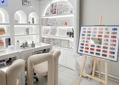 Chic nail salon at @fiftyfreed.sg - Kovan, featuring neat shelves with nail products in Singapore, Singapore, SG.