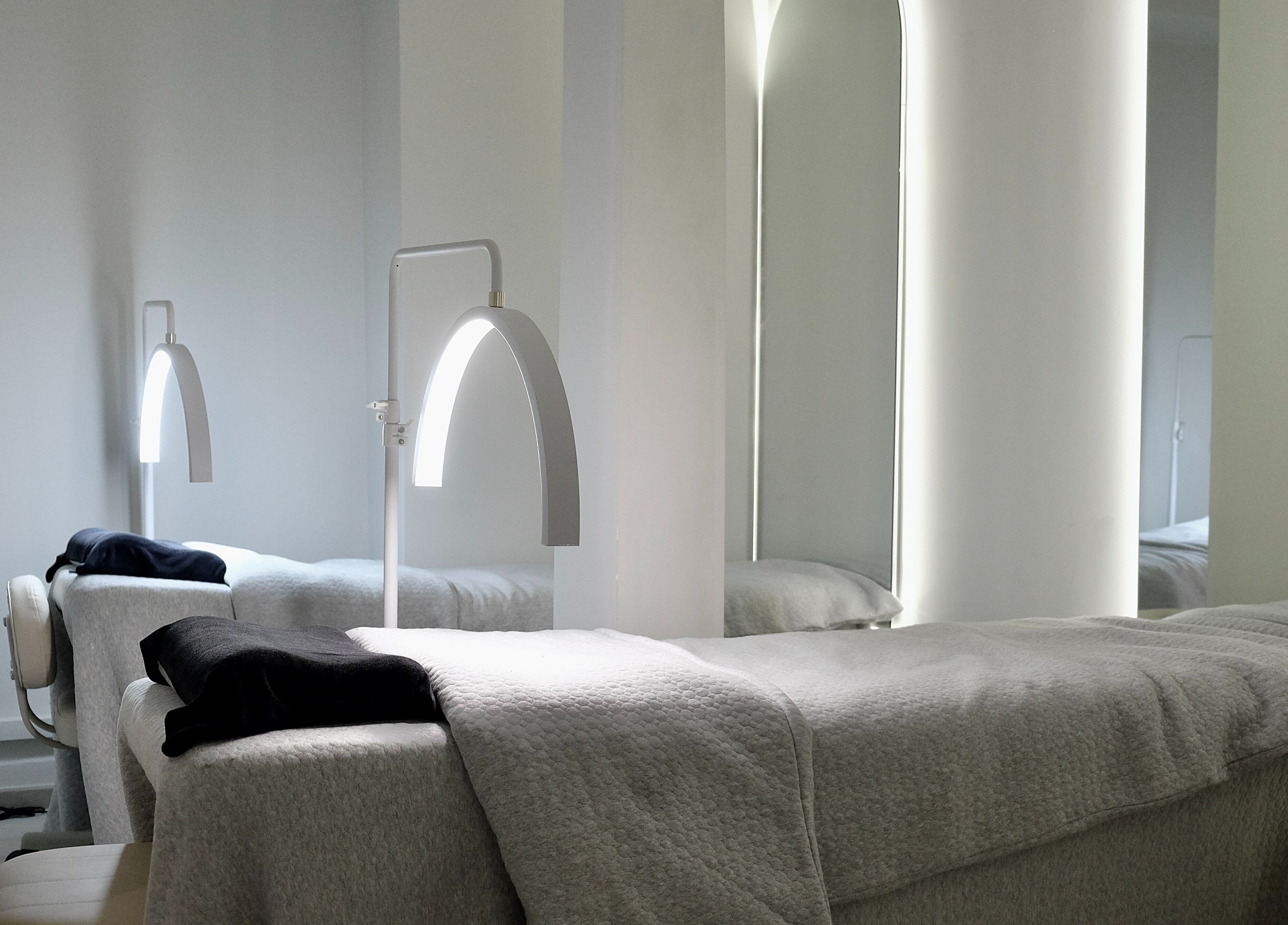 Tranquil spa room at @fiftyfreed.sg - Choa Chu Kang, Singapore, Singapore, SG with modern decor and ambient lighting.