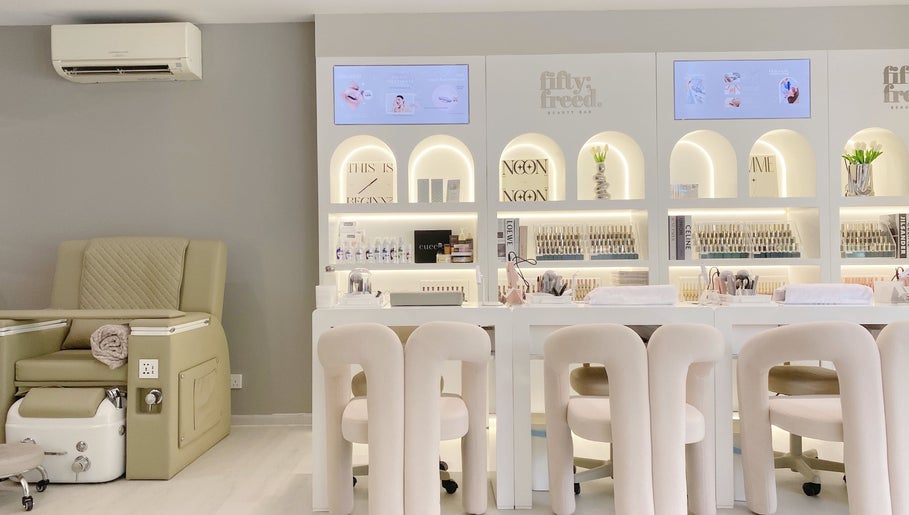 Elegant interior of Fiftyfreed Beauty Bar - Kovan, Singapore, Singapore, SG with plush chairs and modern design.