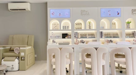 Elegant interior of Fiftyfreed Beauty Bar - Kovan, Singapore, Singapore, SG with plush chairs and modern design.