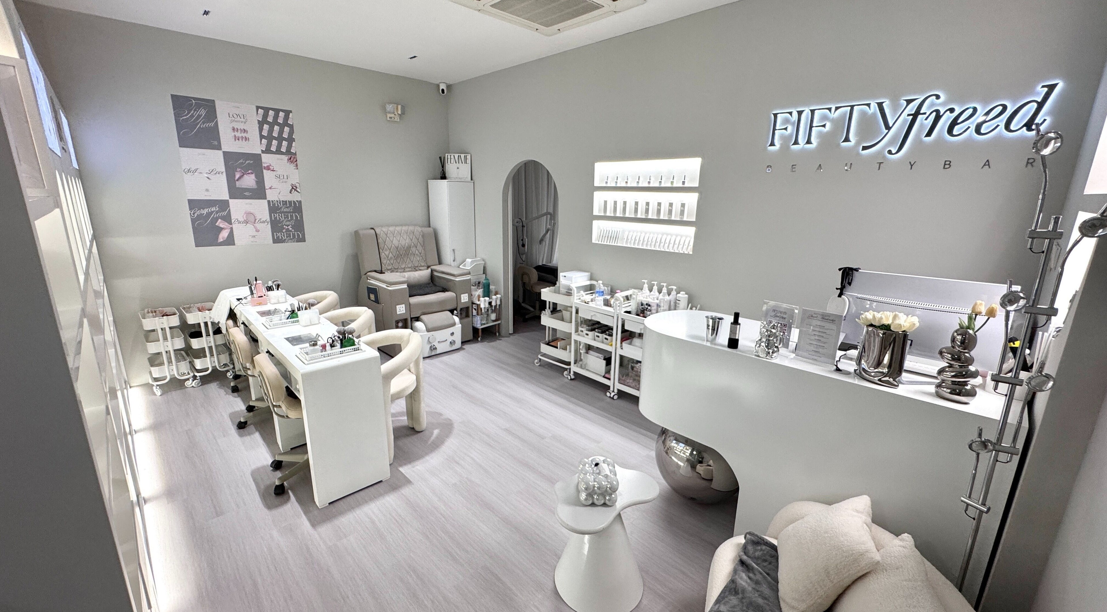 Modern interior of FIFTYFREED - Kovan, Singapore, SG showcasing elegant beauty treatment space.