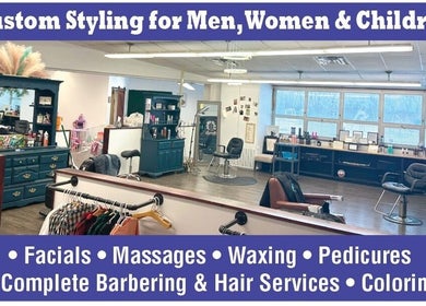 Interior of Westside Beauty & Barbershop in Dunkirk, Indiana, US showing styling stations and services offered.