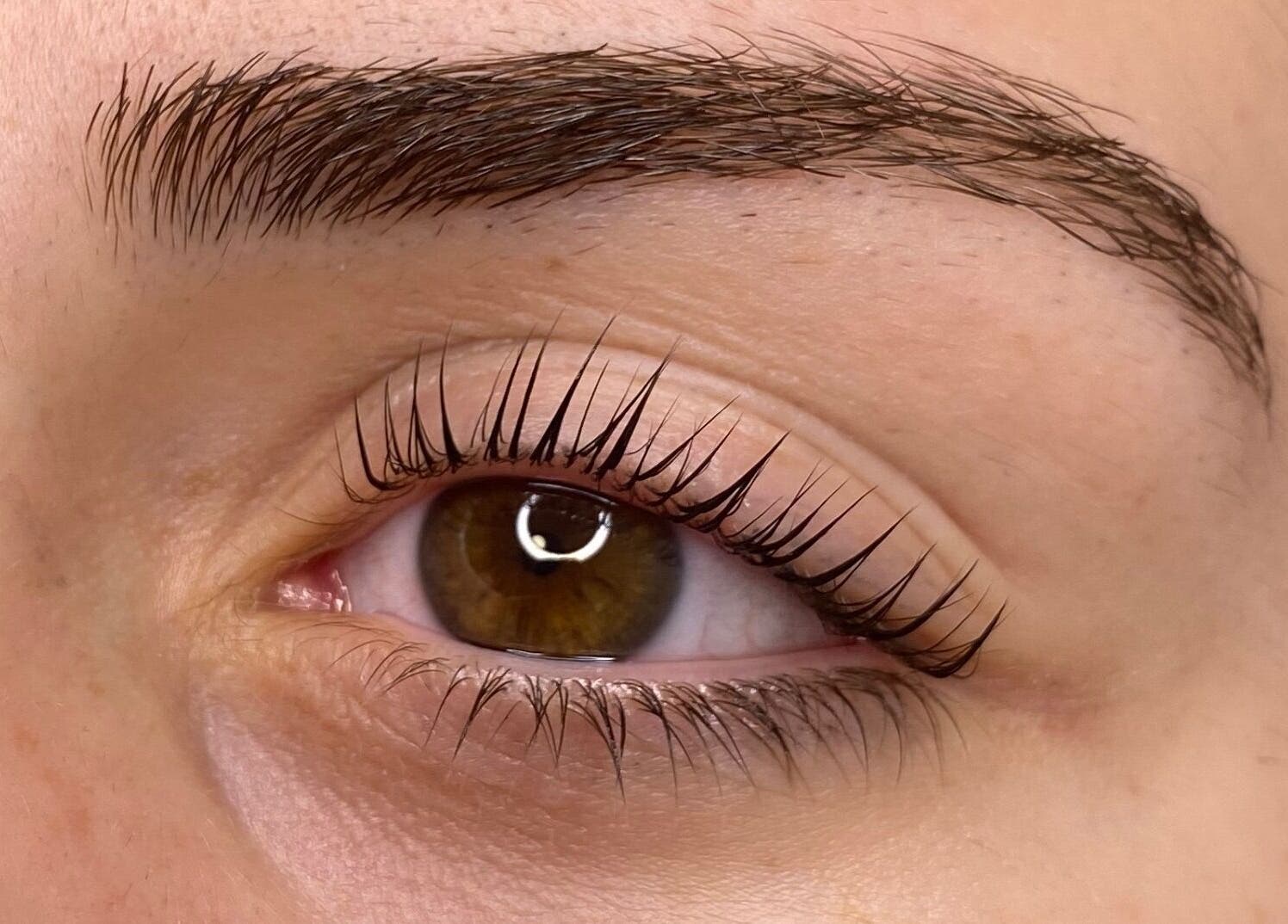 Detailed view of a perfectly groomed eyebrow and eyelash at Poise Studio, Ramsbottom, England, GB.