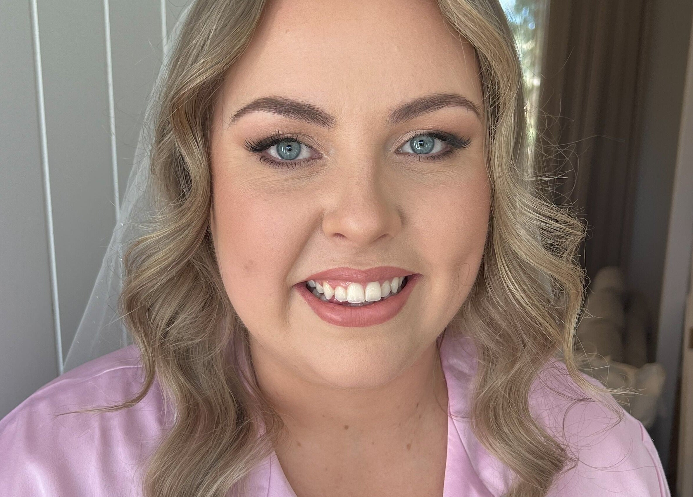 Smiling woman with elegant makeup by Makeup by SJ, Joondalup, Western Australia, AU.