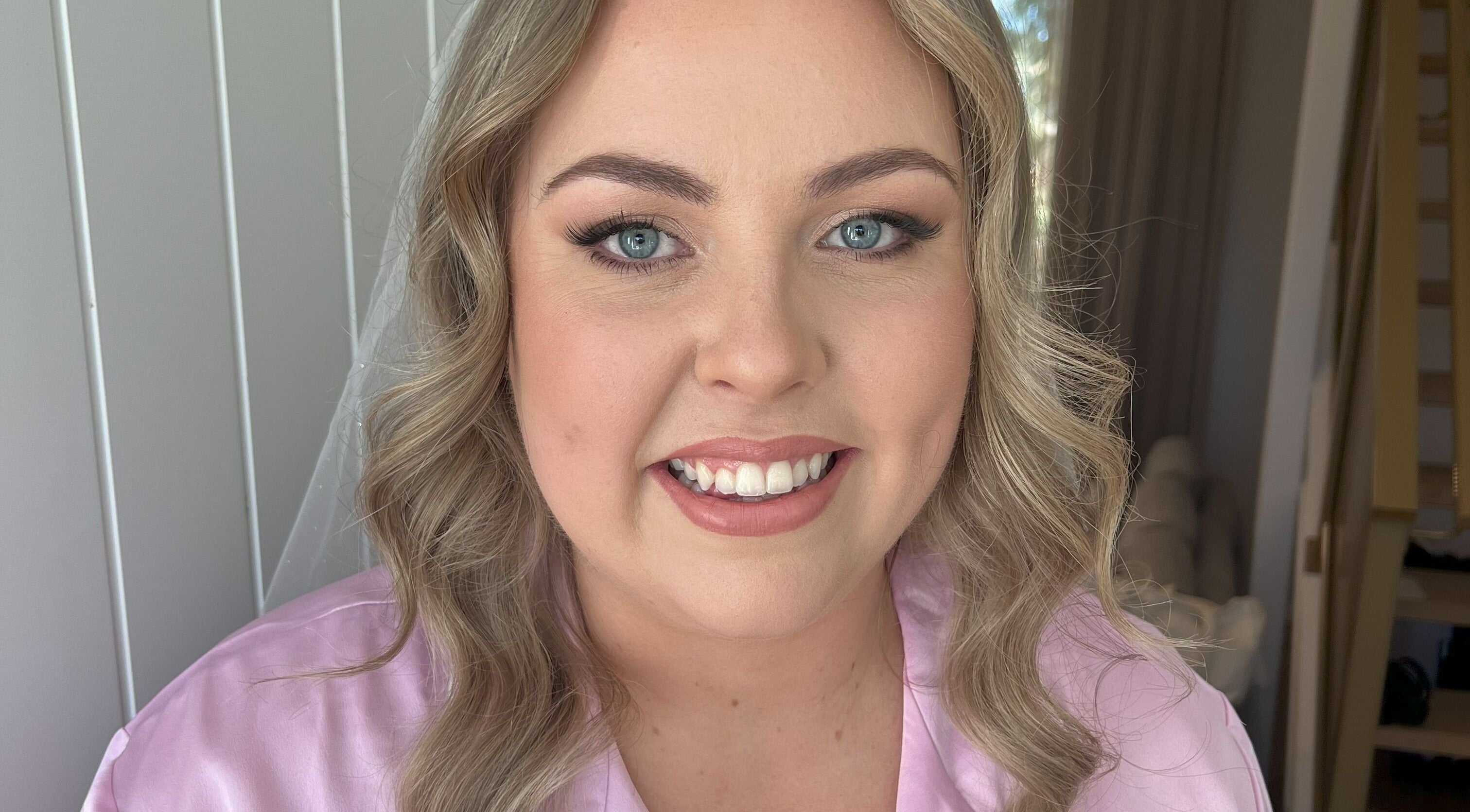 Smiling woman with elegant makeup by Makeup by SJ, Joondalup, Western Australia, AU.