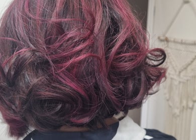 Lush, vibrant curls styled at Connie & Co Hairdressing in Melbourne, Victoria, AU, showcasing expert craftsmanship.