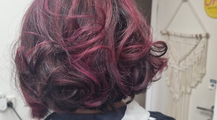 Lush, vibrant curls styled at Connie & Co Hairdressing in Melbourne, Victoria, AU, showcasing expert craftsmanship.