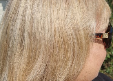 Blonde hair with sunglasses at Connie & Co Hairdressing, Melbourne, Victoria, AU.