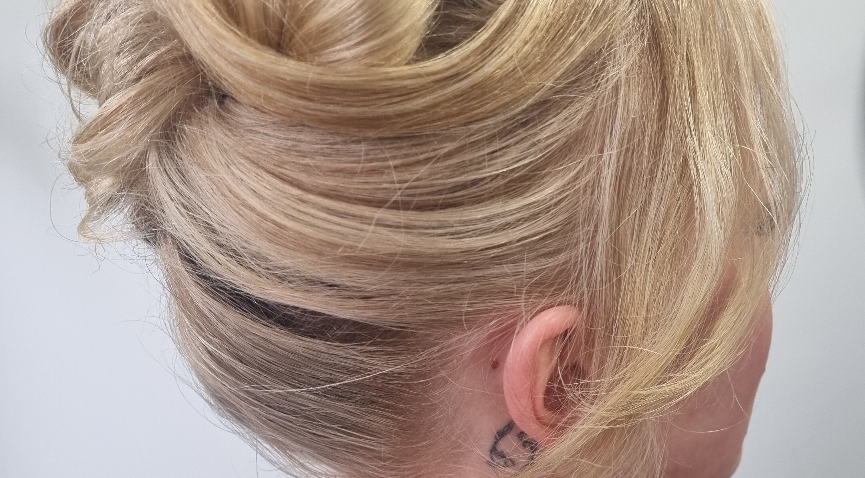 Elegant updo hairstyle at Connie & Co Hairdressing, Melbourne, Victoria, AU.