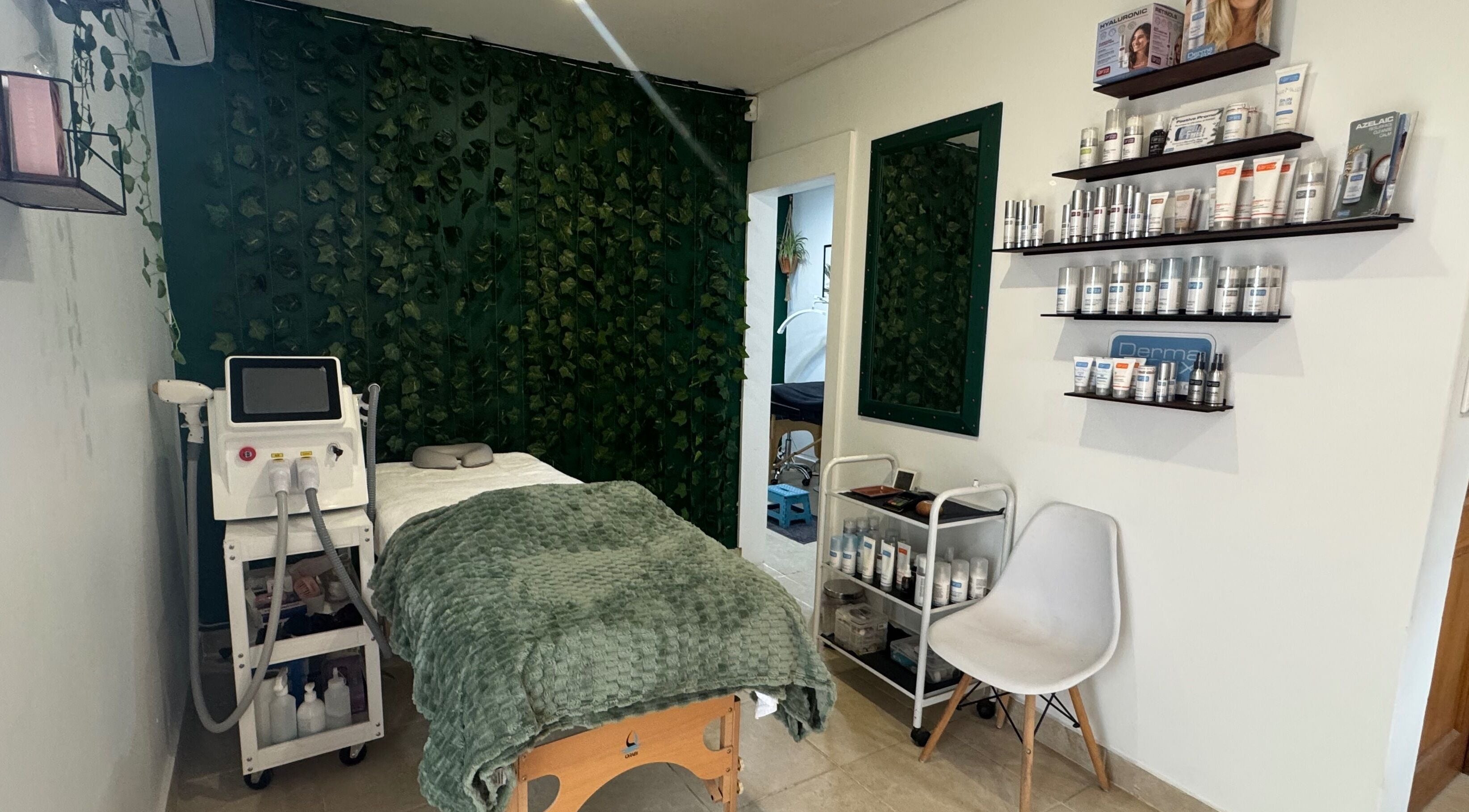 Treatment room at Studio 48, Randburg, Gauteng, ZA with spa bed and greenery décor.