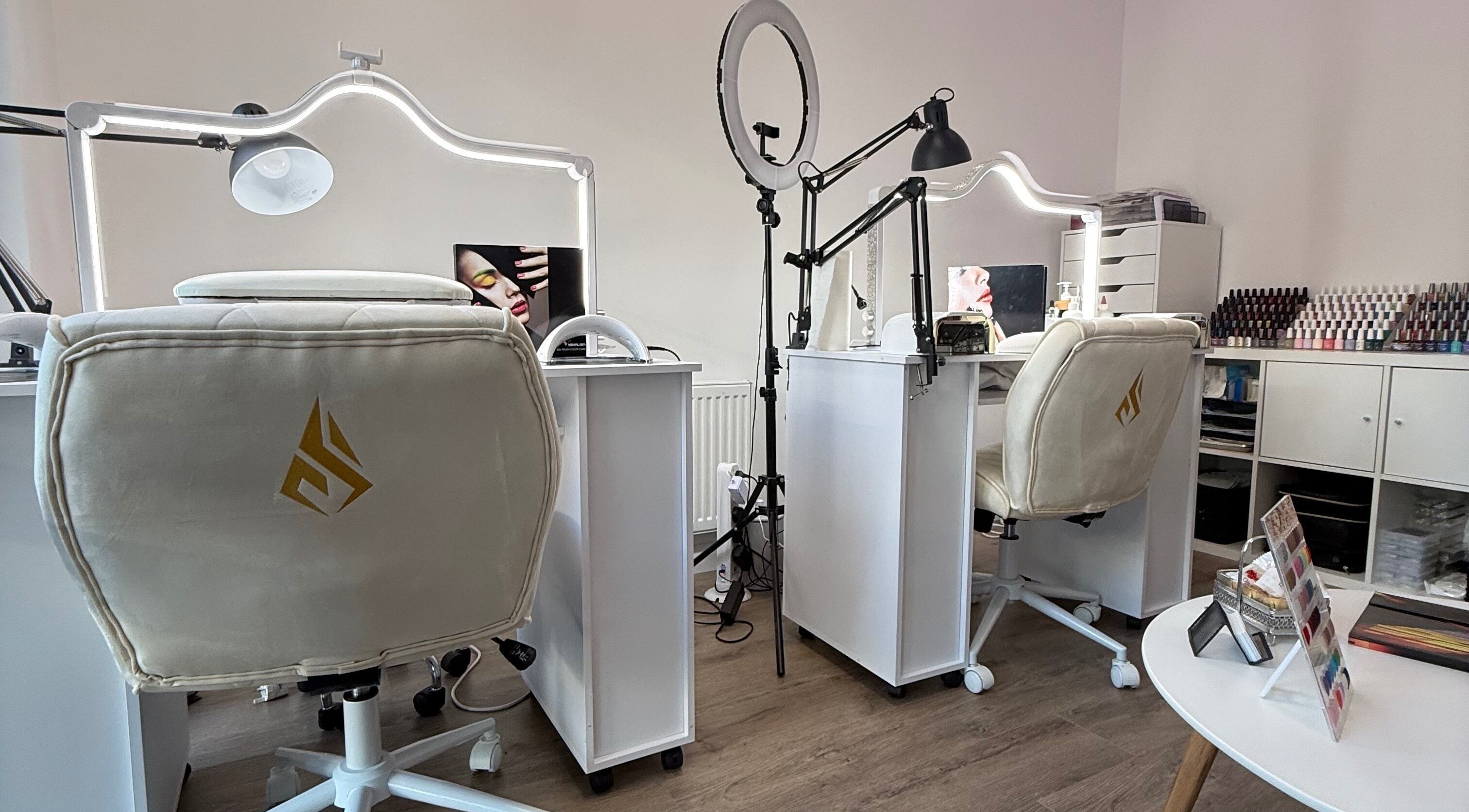 Chic nail stations at Nail Paradise by Neferka, Ashford, England, GB, showcasing an elegant setup.