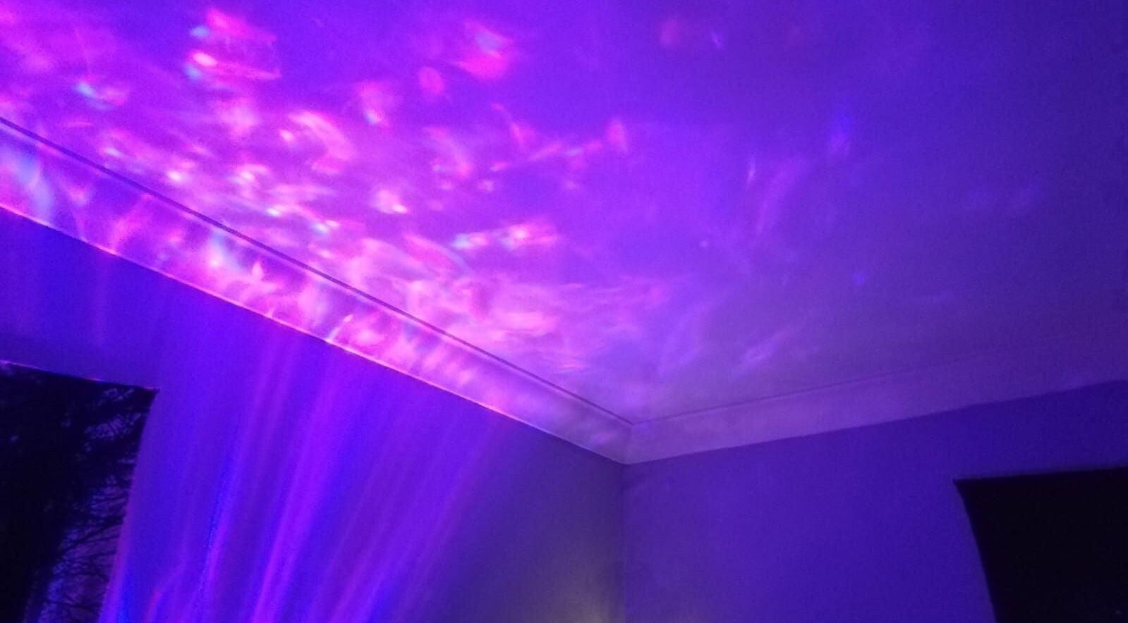 Violet Moon venue with calming purple lights illuminating the ceiling in Westcroft, England, GB.