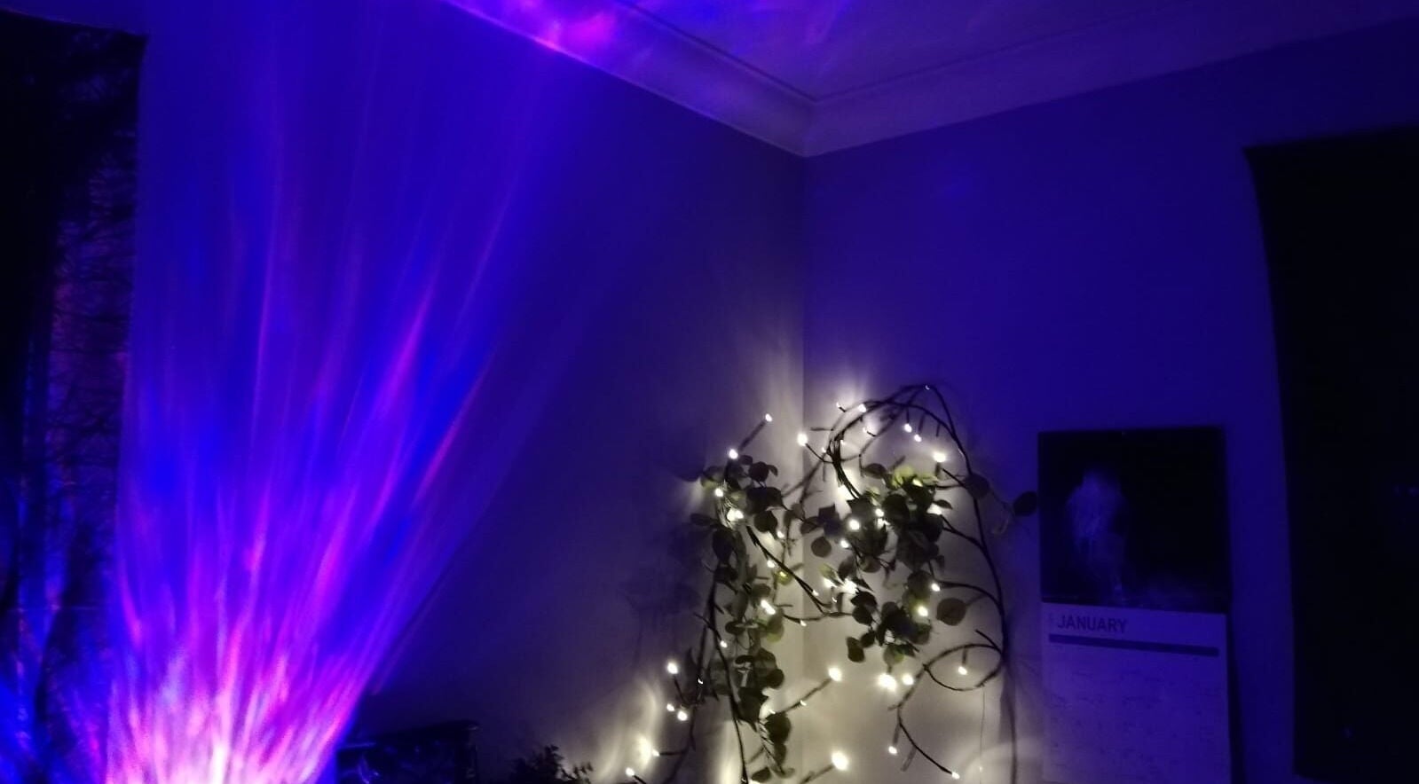 Purple ambiance with glowing lights at Violet Moon, Westcroft, England, GB, creating a tranquil wellness space.