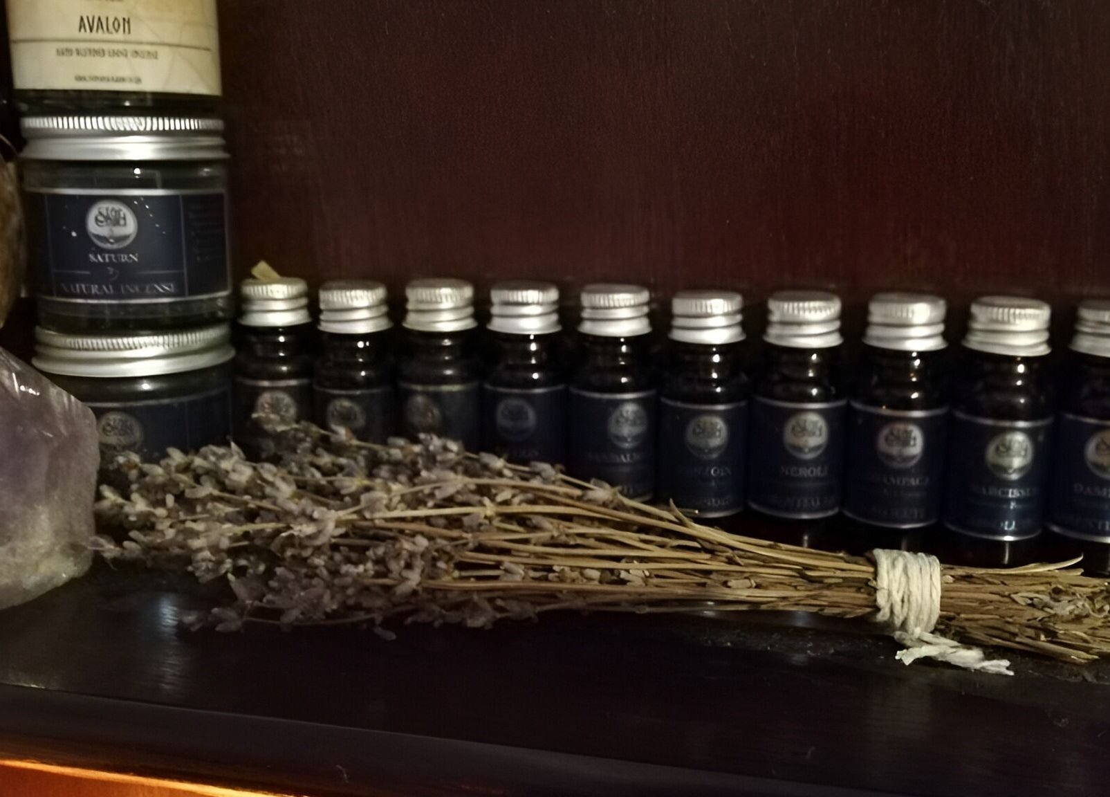 Aromatherapy oils and lavender at Violet Moon, Westcroft, England, GB, creating a soothing atmosphere.