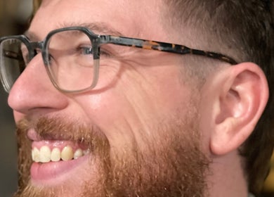 Close-up of a man with a well-groomed beard at The PVD Hair Edit, Providence, Rhode Island, US.
