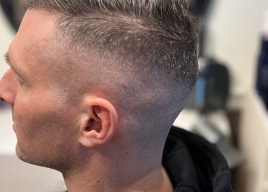 Close-up of a stylish men's fade haircut at The PVD Hair Edit, Providence, Rhode Island, US.