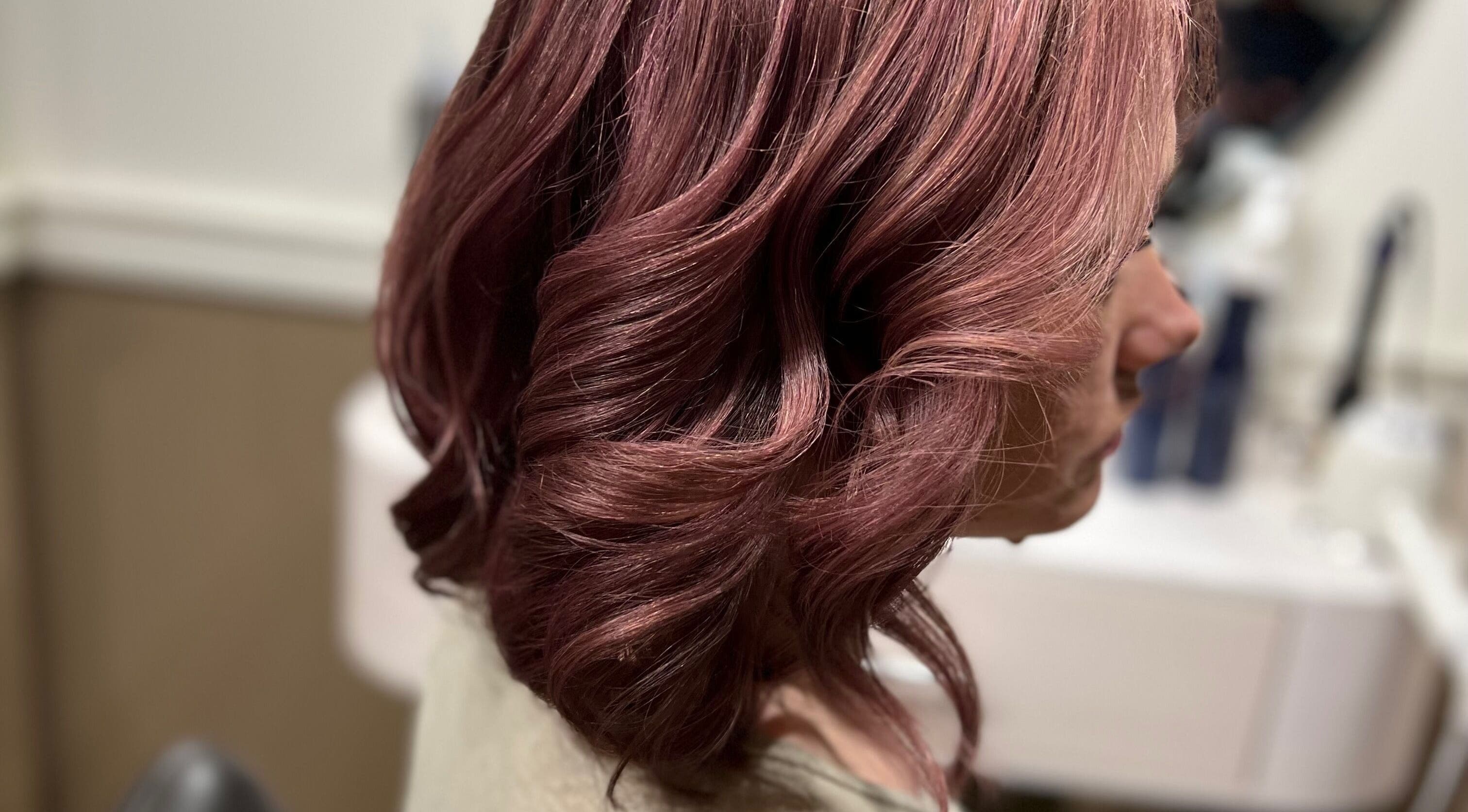 Rose-colored hair styled in waves at The PVD Hair Edit, Providence, Rhode Island, US.