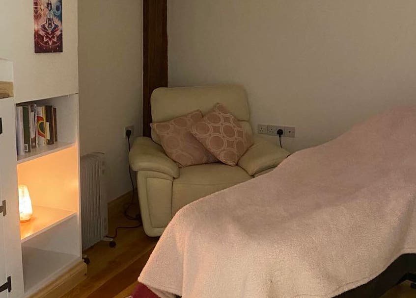 Cozy massage room at Soul2Sole by Emma White in Egmanton, England, GB, featuring a plush chair and soft lighting.