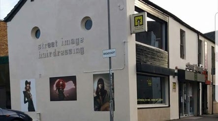 Street Image Hairdressing front view in Kirkintilloch, Scotland, GB showcasing its stylish modern facade.