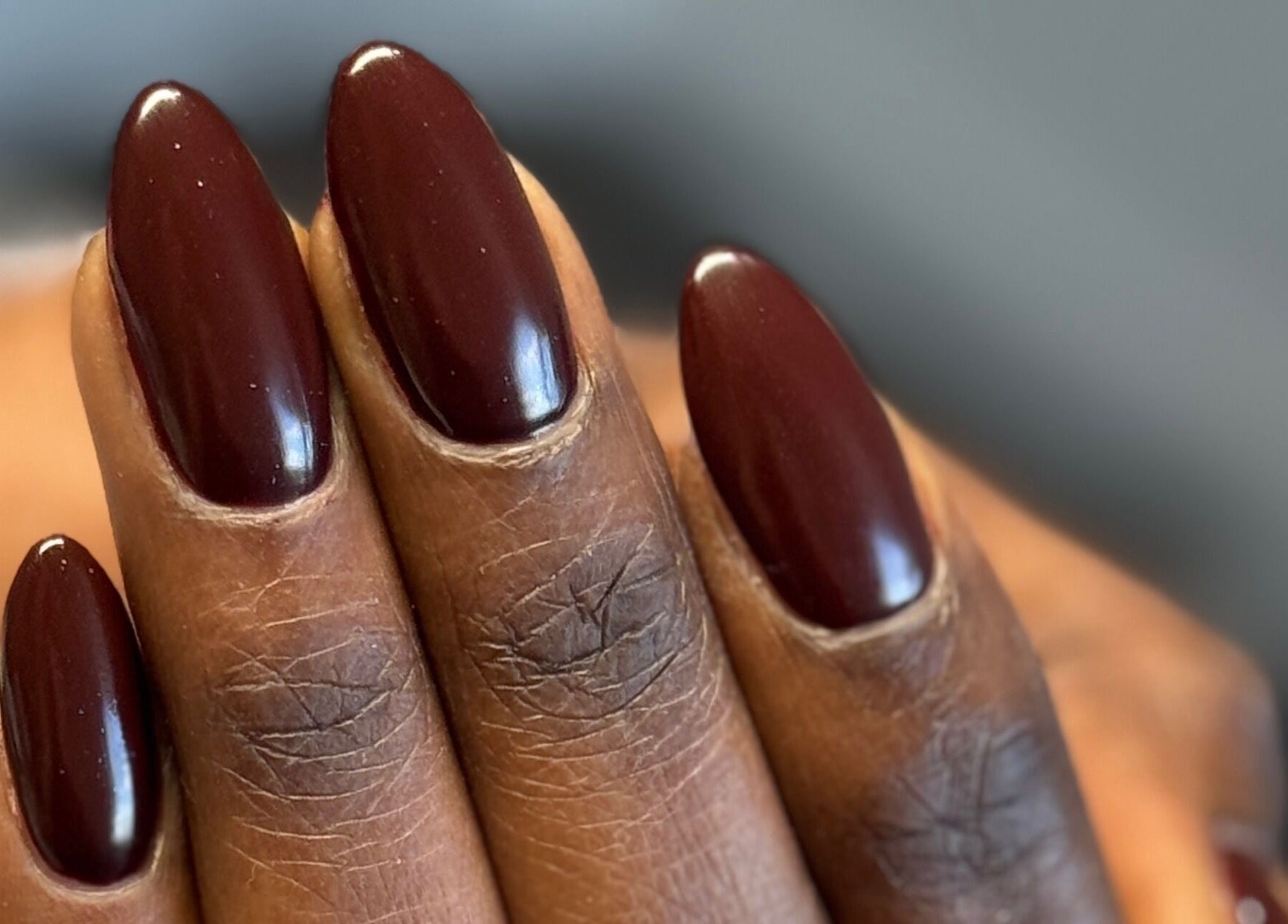 Close-up of elegant, mahogany-colored nails at SaHaR(Pyrmont) in Ultimo, New South Wales, AU.