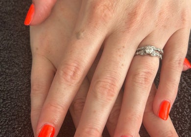 Elegant hands with vibrant nails at R and R Tranquility, Aberdeen, Scotland, GB.