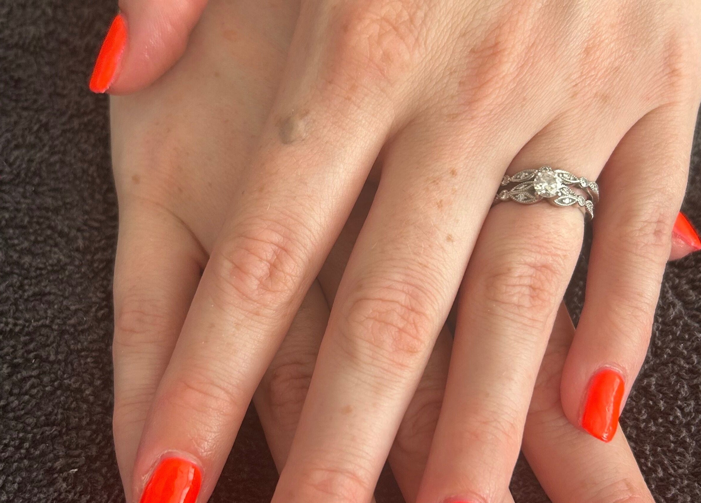 Elegant hands with vibrant nails at R and R Tranquility, Aberdeen, Scotland, GB.