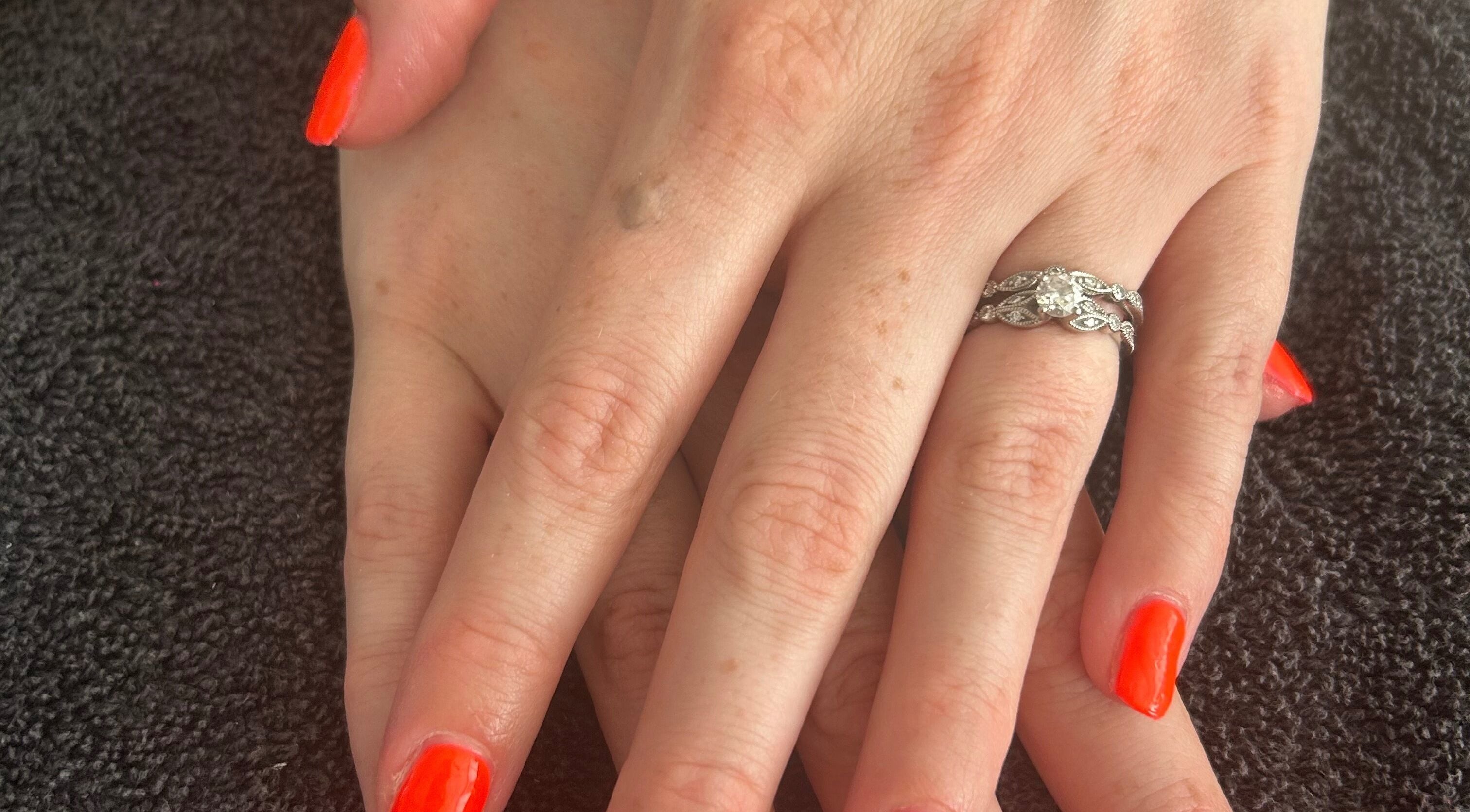 Elegant hands with vibrant nails at R and R Tranquility, Aberdeen, Scotland, GB.
