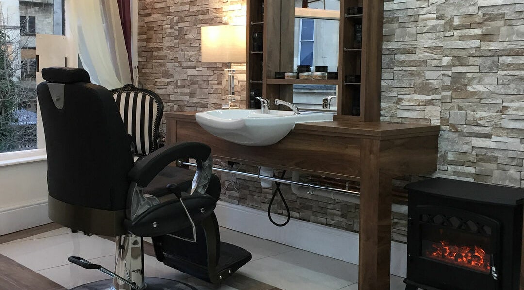 Elegant barber chair and sink at Berkeley Barbers, Bristol, England, GB.