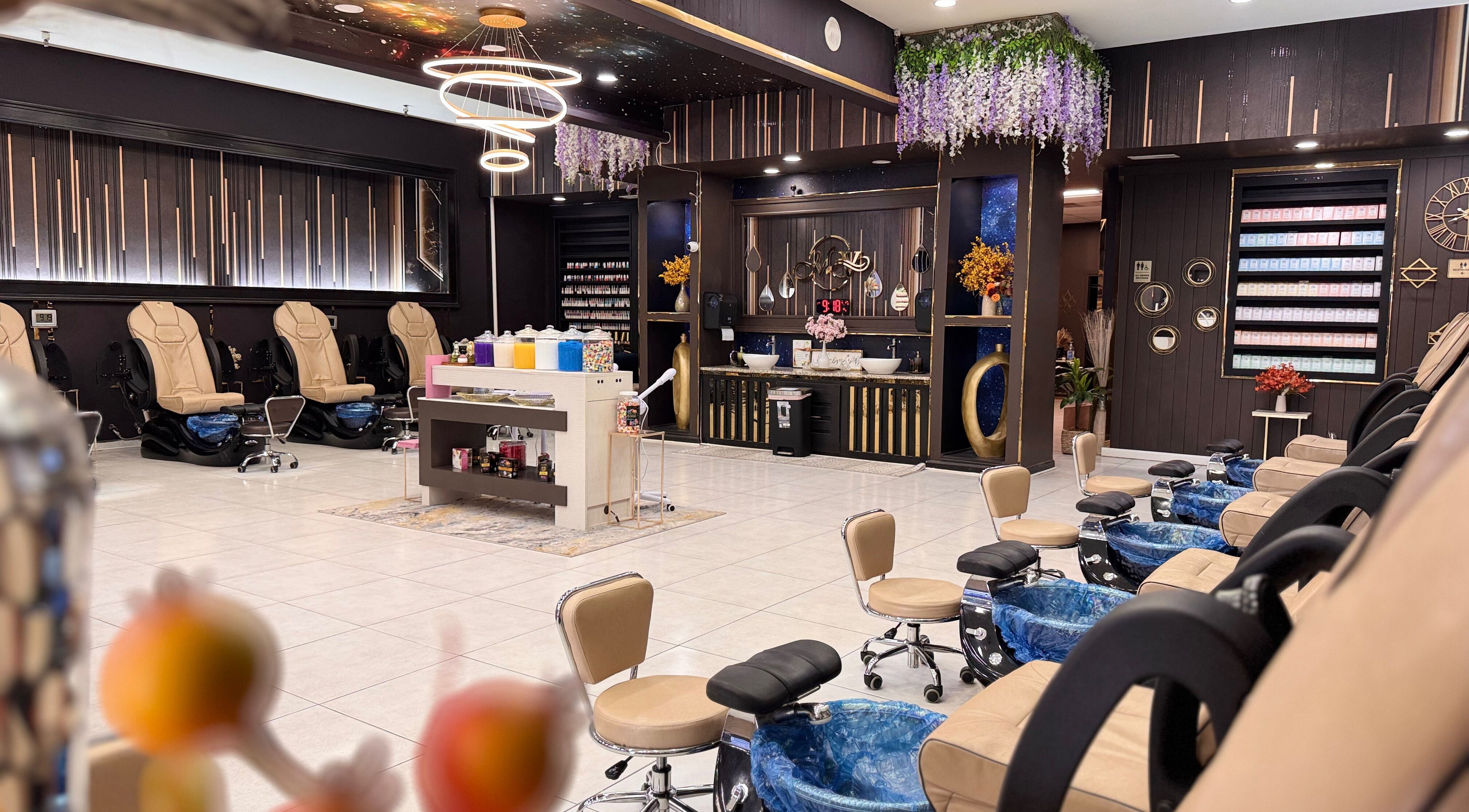 Luxurious interior of NL Nail lounge and bar, Corydon, Indiana, US, with chic seating and modern decor.