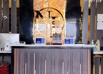 Reception desk at NL Nail Lounge and Bar (Corydon) showcasing modern decor in Corydon, Indiana, US.