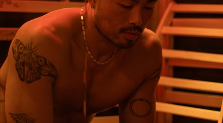 Relaxing sauna session at Studio Sweat, located in Auckland, NZ, offering premium wellness experiences.