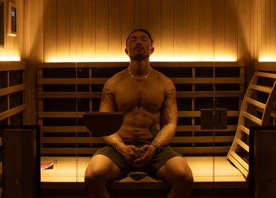 Relaxing sauna experience at Studio Sweat in Auckland, Auckland, NZ, featuring warm ambient lighting.