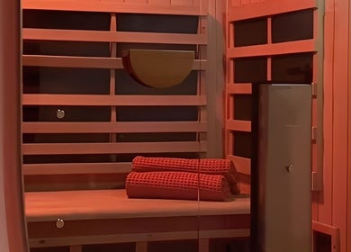 Luxurious infrared sauna at Studio Sweat, Auckland, NZ, offering relaxation and rejuvenation.