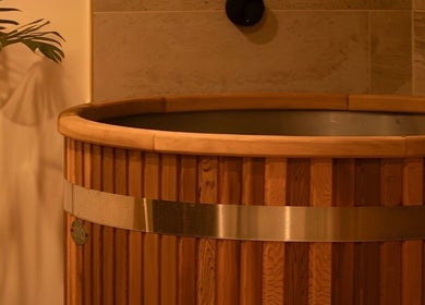 Elegant wooden bath at Studio Sweat in Auckland, Auckland, NZ, offering a serene wellness escape.