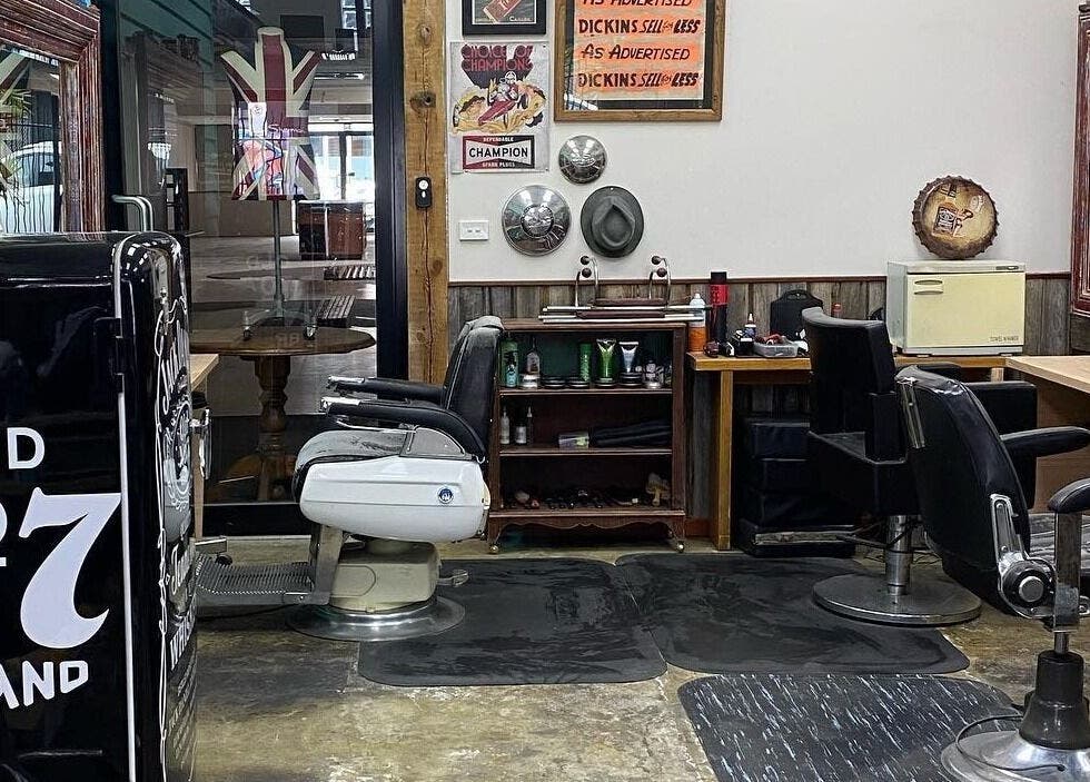 Chic interior of The Alley Barber Frankston in Frankston, VIC, AU with vintage decor and barber chairs.