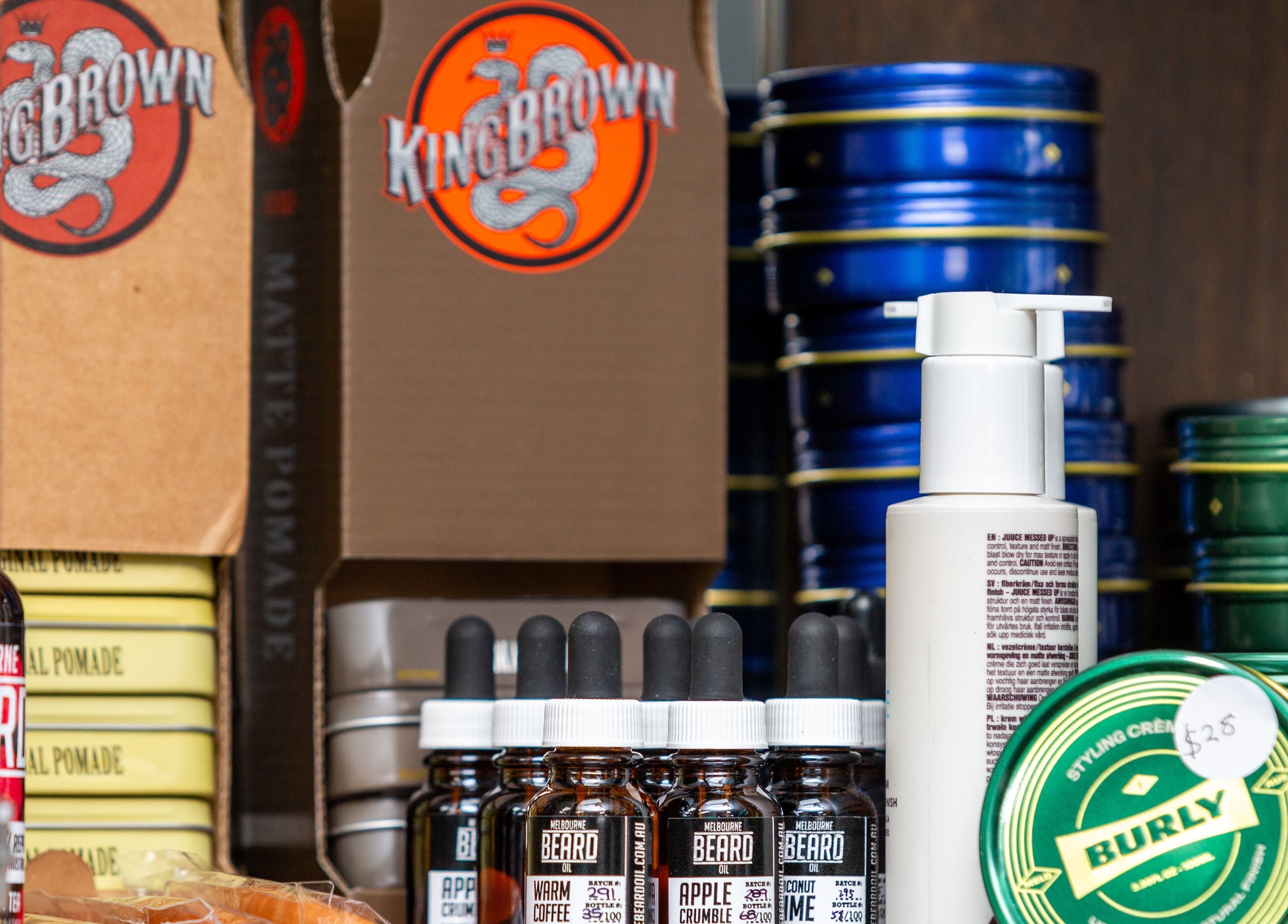 Grooming products at The Alley Barber Frankston, Frankston, VIC, AU, showcasing premium styling creams and oils.